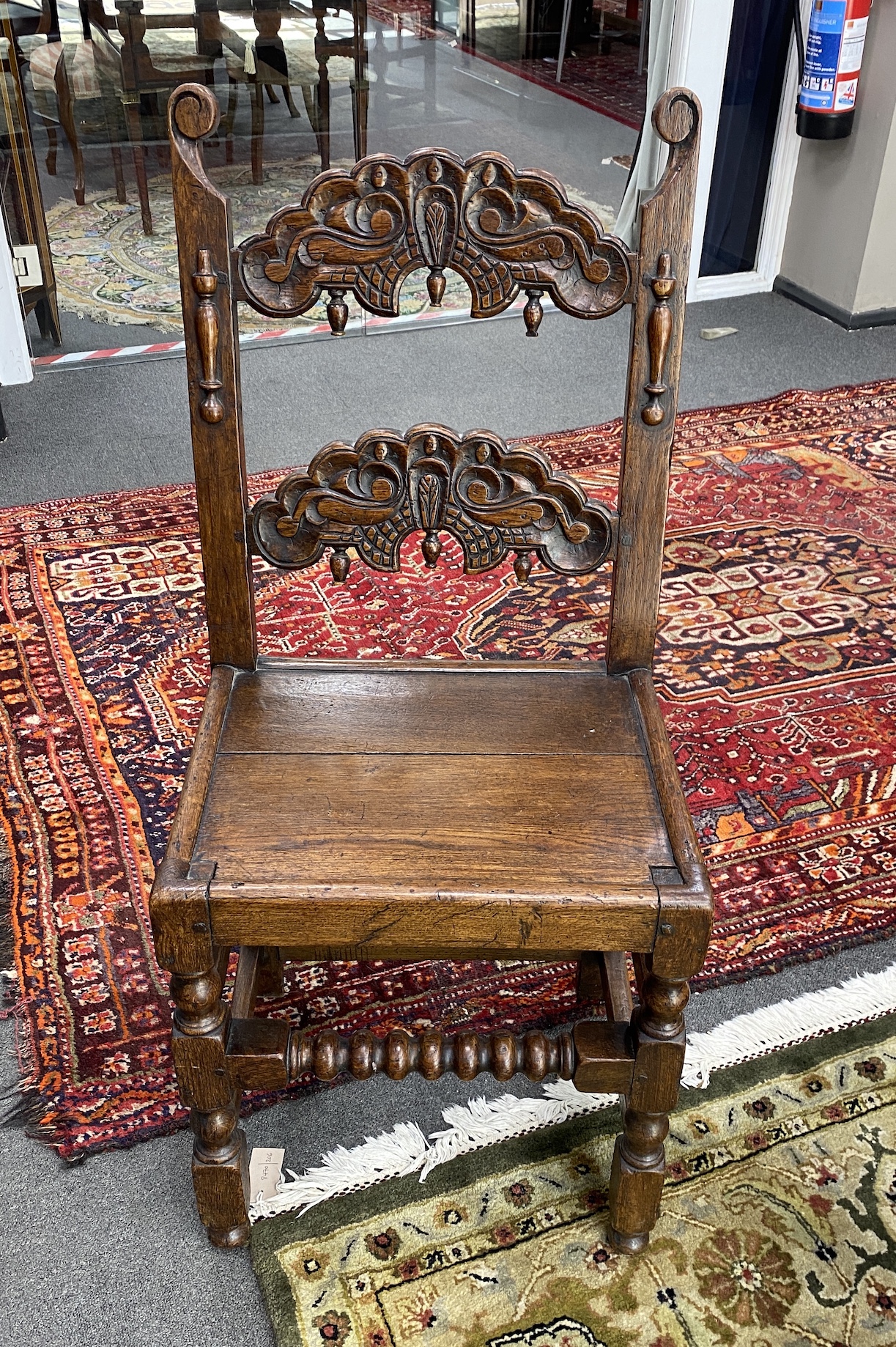 An 18th century and later rectangular oak refectory dining table, length 194cm, width 83cm, height 79cm and two Derbyshire style oak chairs